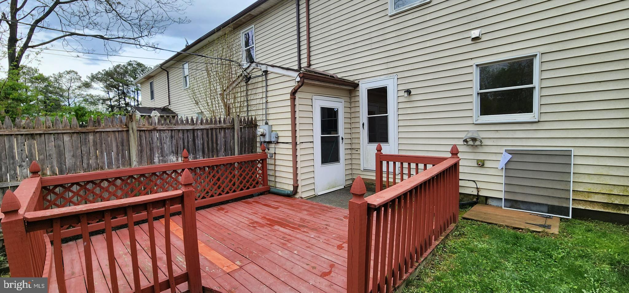Deck with door to storage.