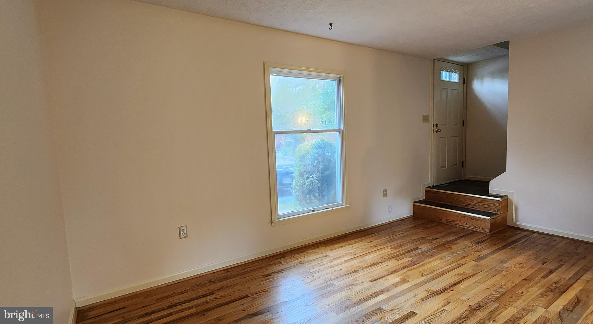 Living room with hardwood floors.