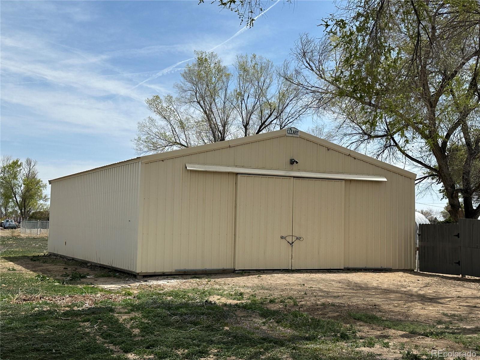 Undisclosed Address Pueblo, CO 81006 - Photo 22 of 27 a backyard of a house