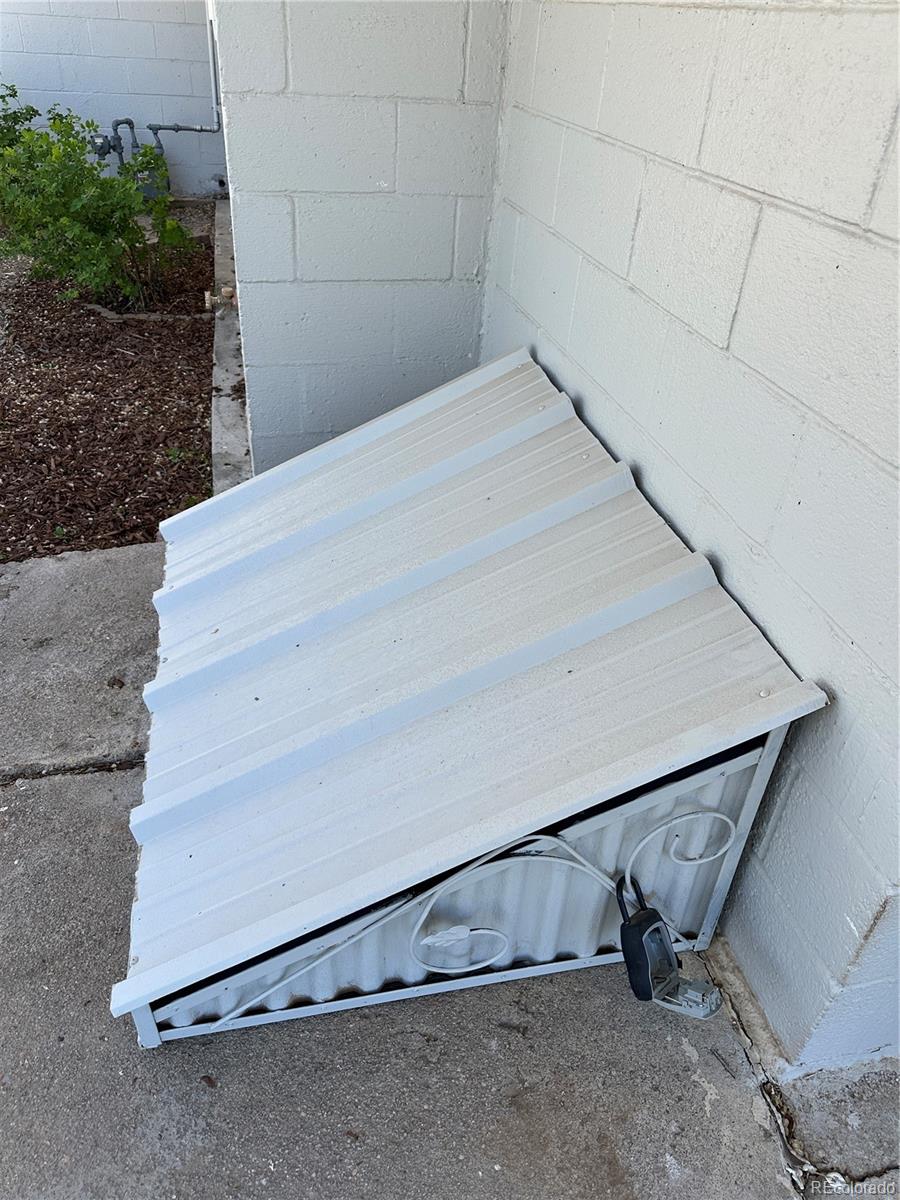 Undisclosed Address Pueblo, CO 81006 - Photo 23 of 27 a room with a bench