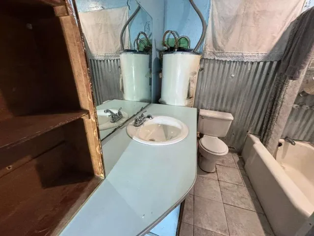 a view of storage and utility room