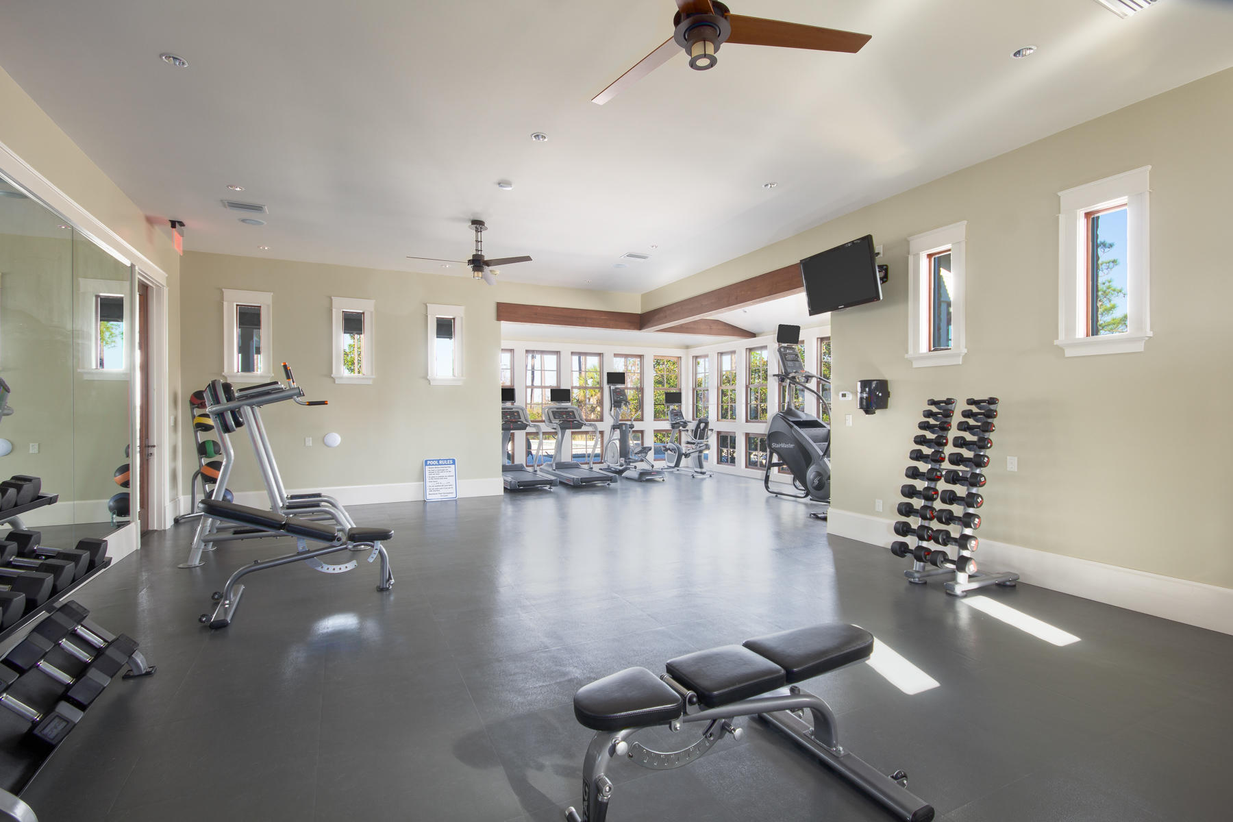 79 Perrin, Unit LOT 54 Santa Rosa Beach, FL 32459 - Photo 26 of 36 a gym room with lots of gym equipment