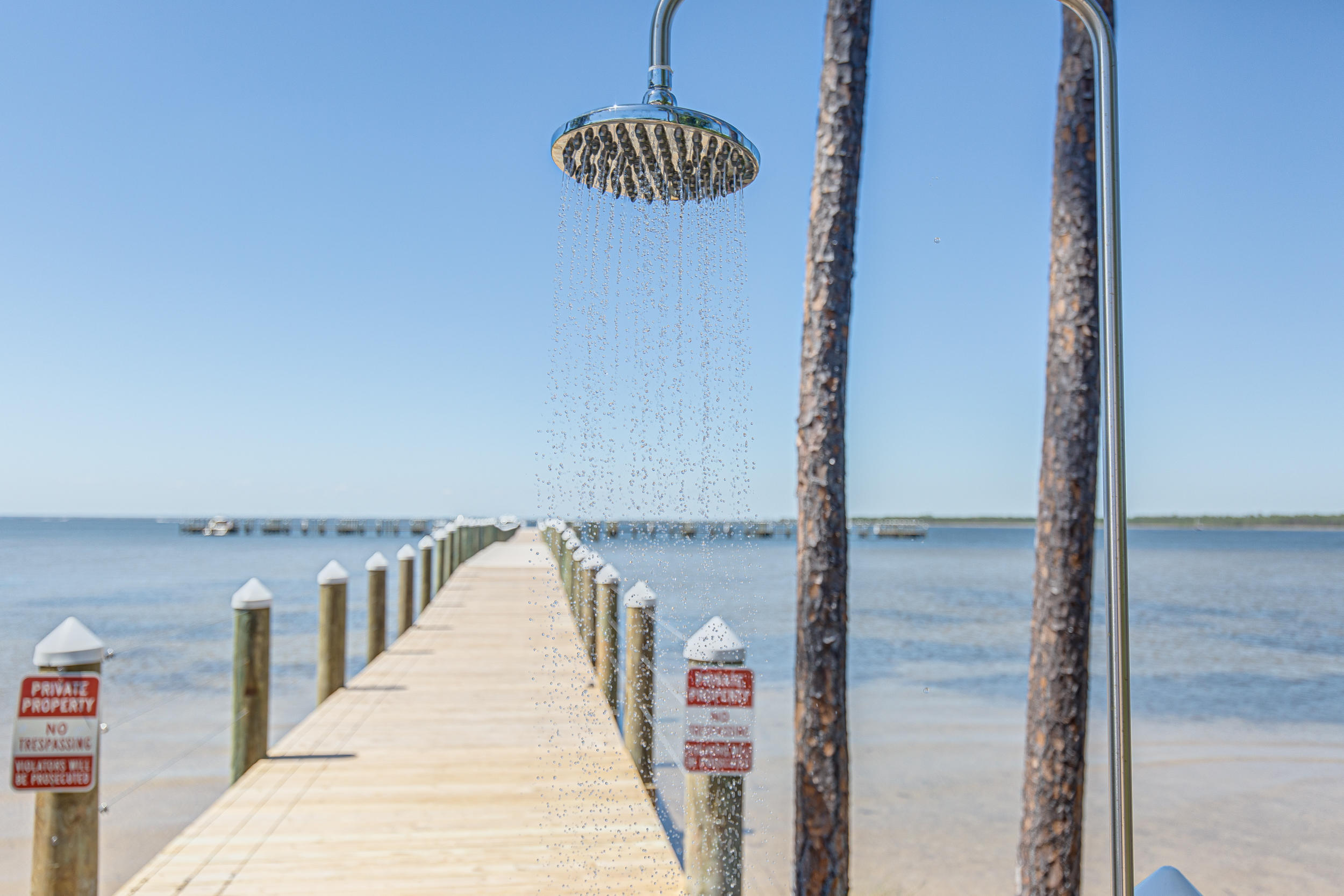 79 Perrin, Unit LOT 54 Santa Rosa Beach, FL 32459 - Photo 31 of 36 a hallway with sliding door and stairs