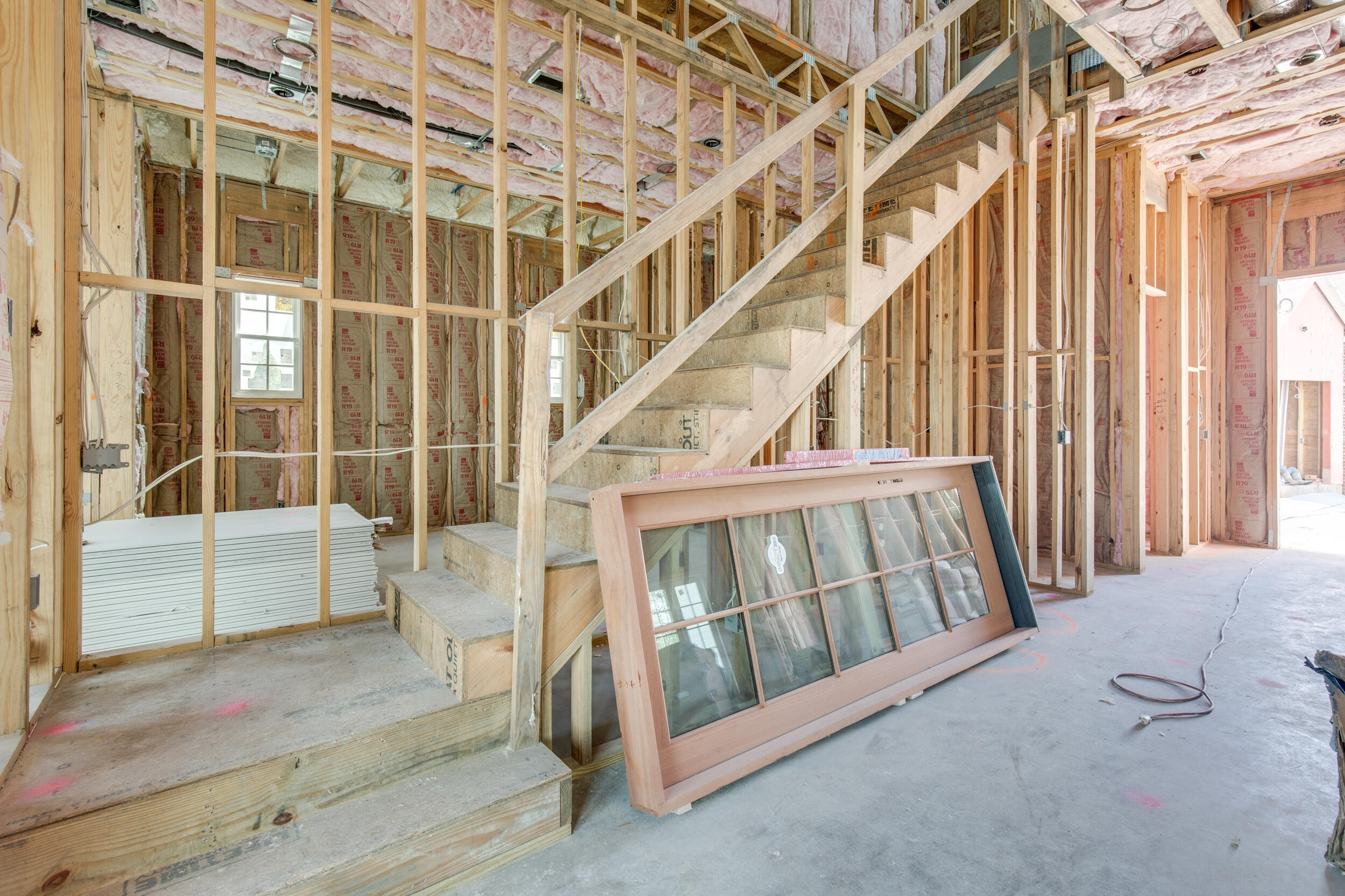 79 Perrin, Unit LOT 54 Santa Rosa Beach, FL 32459 - Photo 5 of 36 a view of staircase with white walls and windows