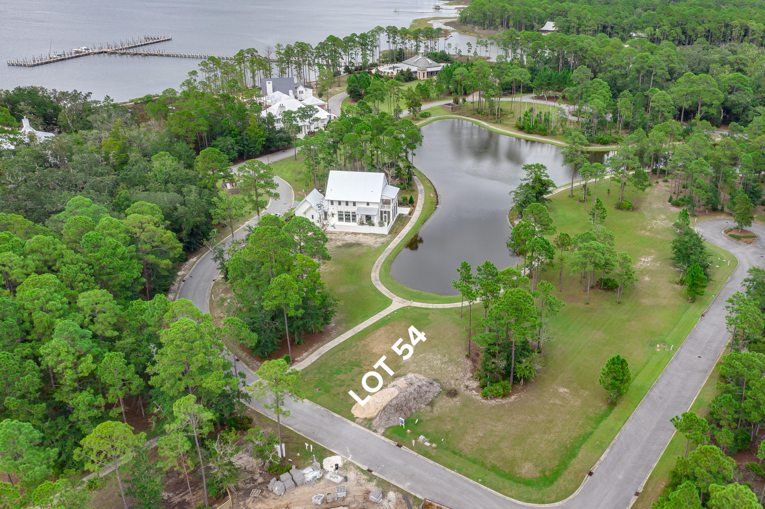 79 Perrin, Unit LOT 54 Santa Rosa Beach, FL 32459 - Photo 7 of 36 an aerial view of a residential houses with outdoor space