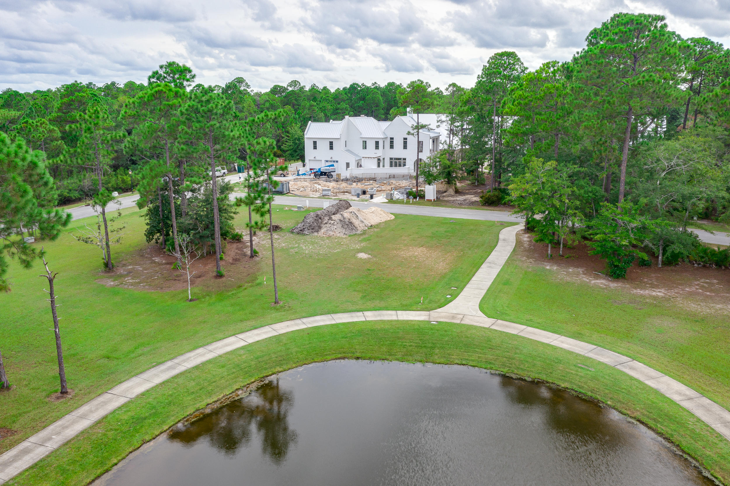 79 Perrin, Unit LOT 54 Santa Rosa Beach, FL 32459 - Photo 8 of 36 a view of a swimming pool with a yard