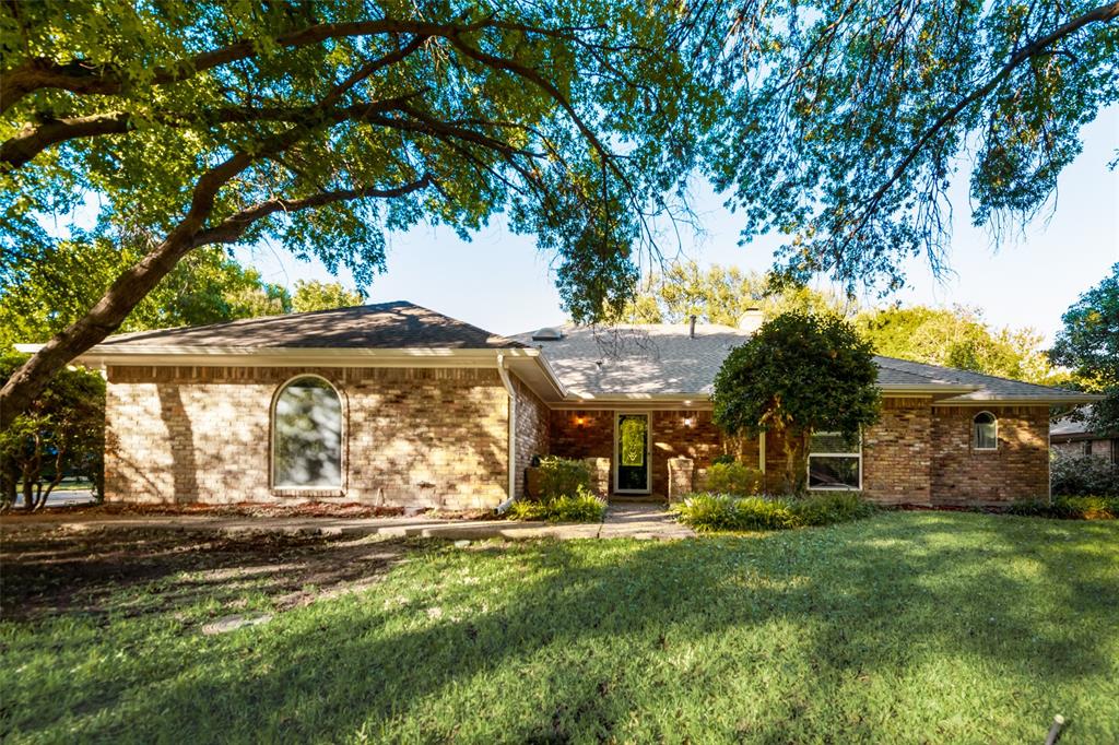 308 Meadowcreek Road Coppell, TX 75019 - Photo 1 of 1 a view of a house with a tree in a yard