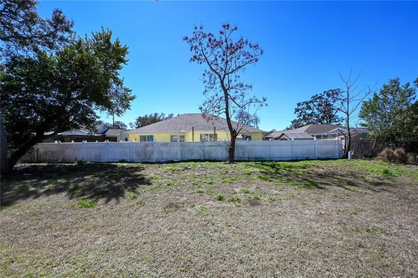 a view of a backyard with a garden