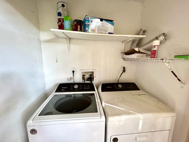 741 North Pine Island Road, Unit 303 Plantation, FL 33324 - Photo 19 of 32 a utility room with dryer and washer