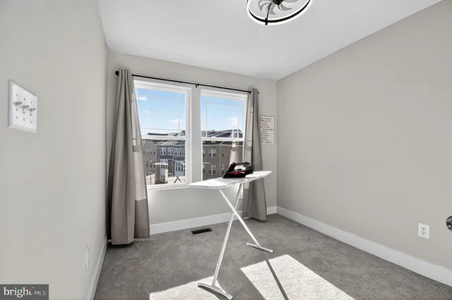 a room with a table and a window