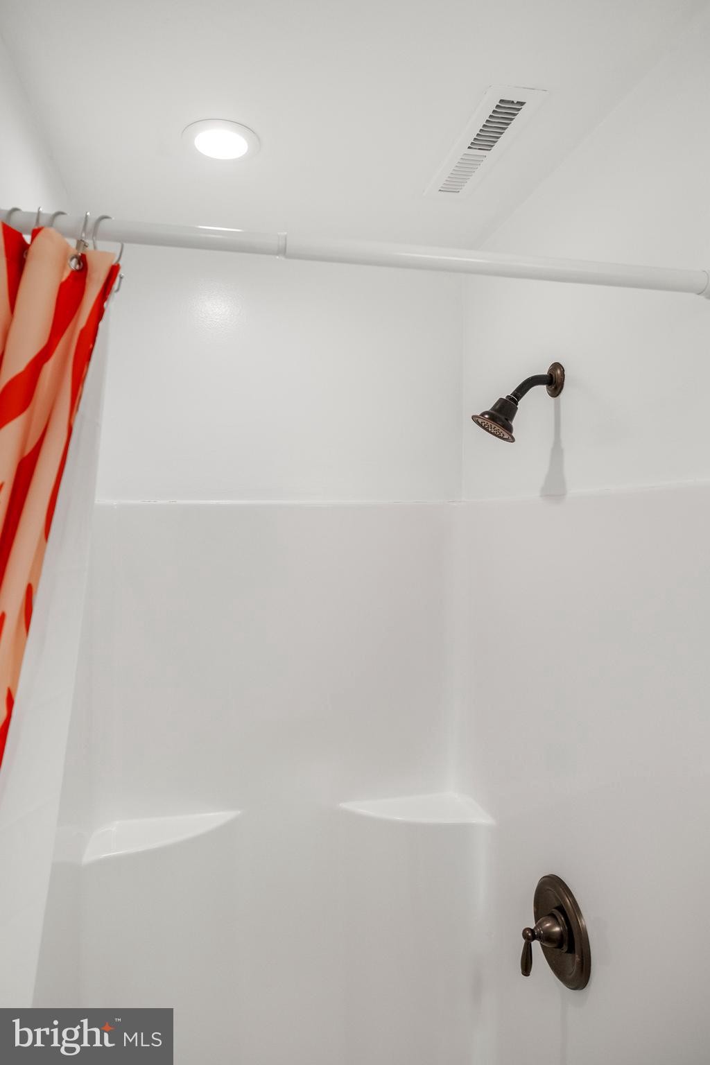 170 Captains Quarters Road, Unit 201 Ocean City, MD 21842 - Photo 34 of 65 a bathroom with a shower