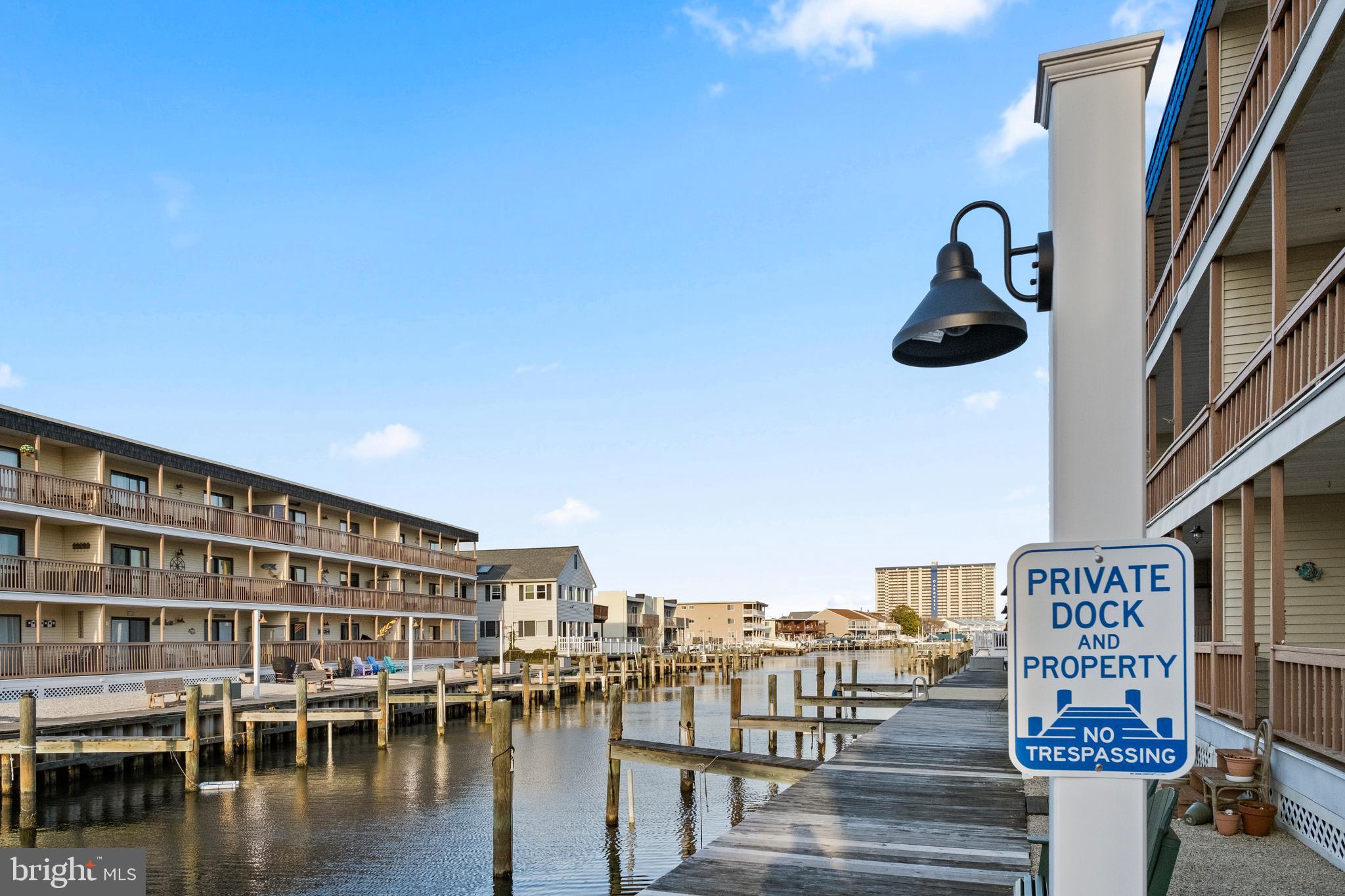 170 Captains Quarters Road, Unit 201 Ocean City, MD 21842 - Photo 38 of 65 a view of roof deck with building and ocean view