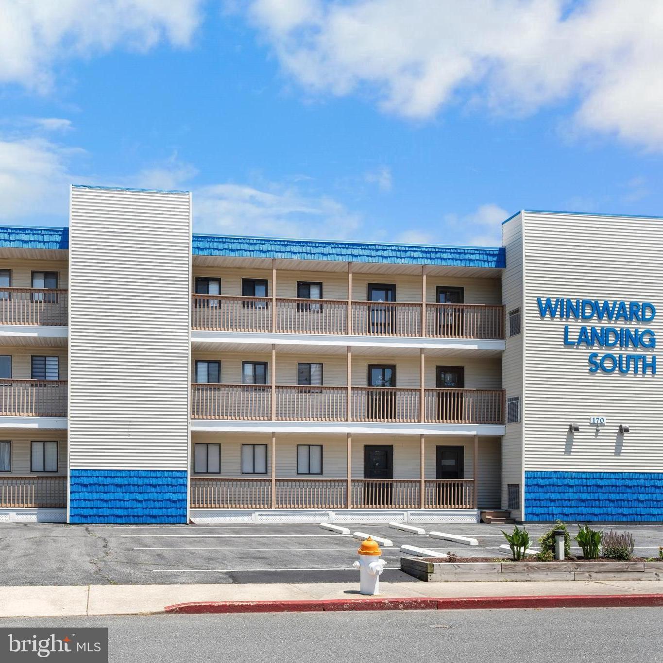 170 Captains Quarters Road, Unit 201 Ocean City, MD 21842 - Photo 4 of 65 a front view of a building with streets and trees