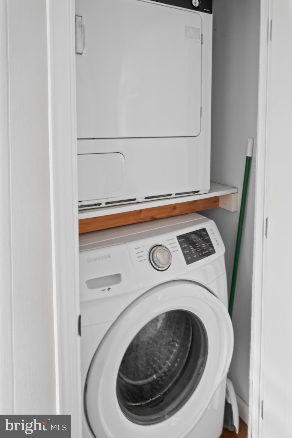 170 Captains Quarters Road, Unit 201 Ocean City, MD 21842 - Photo 46 of 65 a utility room with dryer and washer