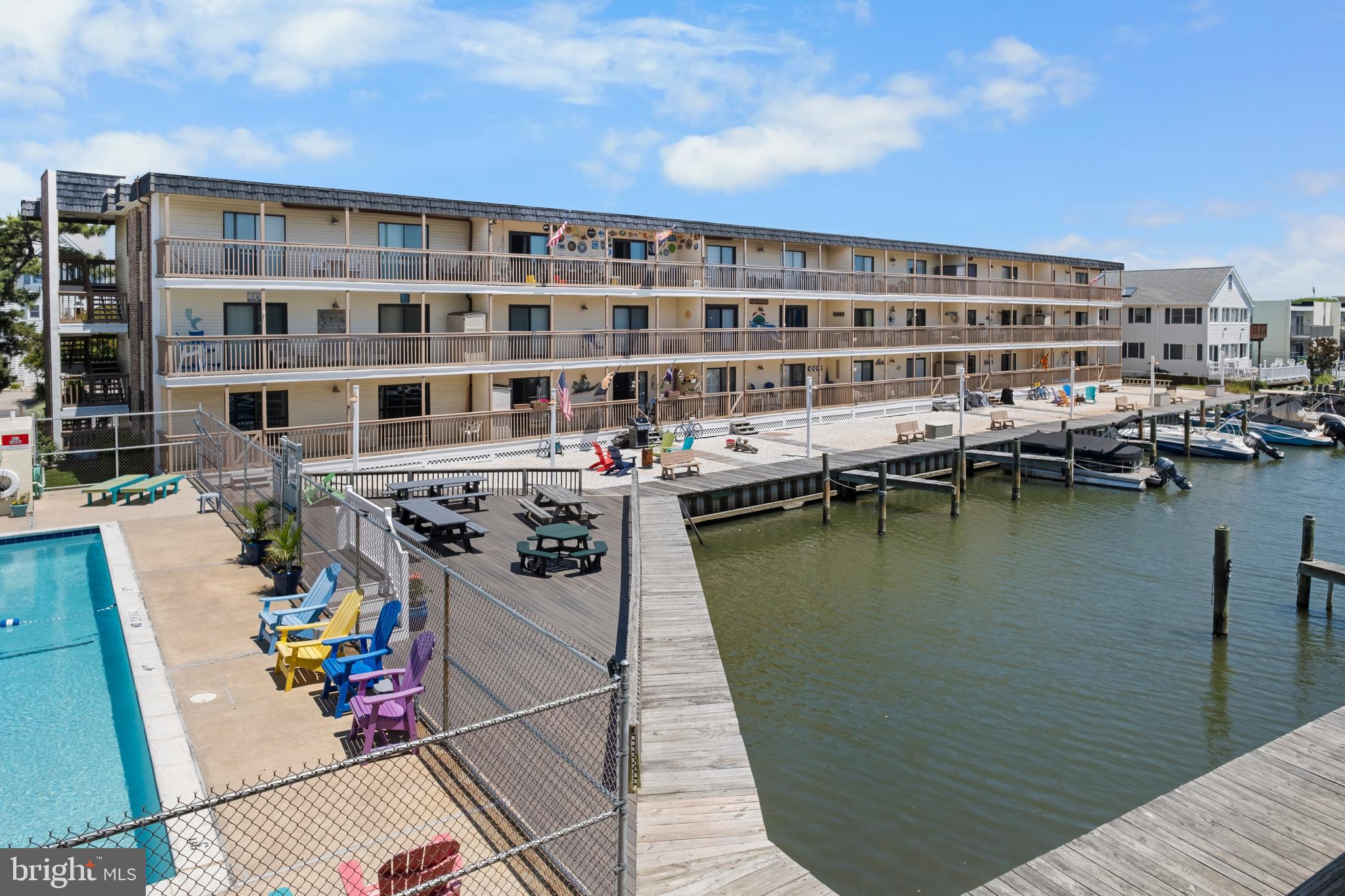 170 Captains Quarters Road, Unit 201 Ocean City, MD 21842 - Photo 6 of 65 a view of a water fountain and a patio