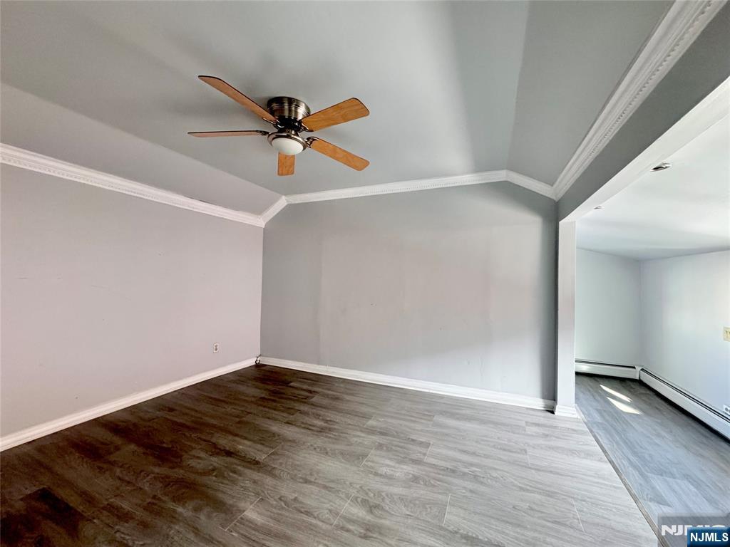 227 Washington Avenue Hackensack, NJ 07601 - Photo 13 of 33 wooden floor in an empty room