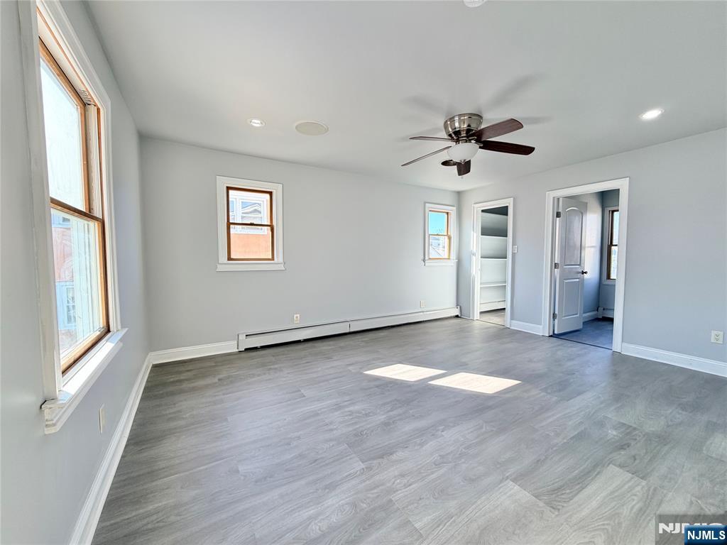227 Washington Avenue Hackensack, NJ 07601 - Photo 19 of 33 a view of an empty room with a window