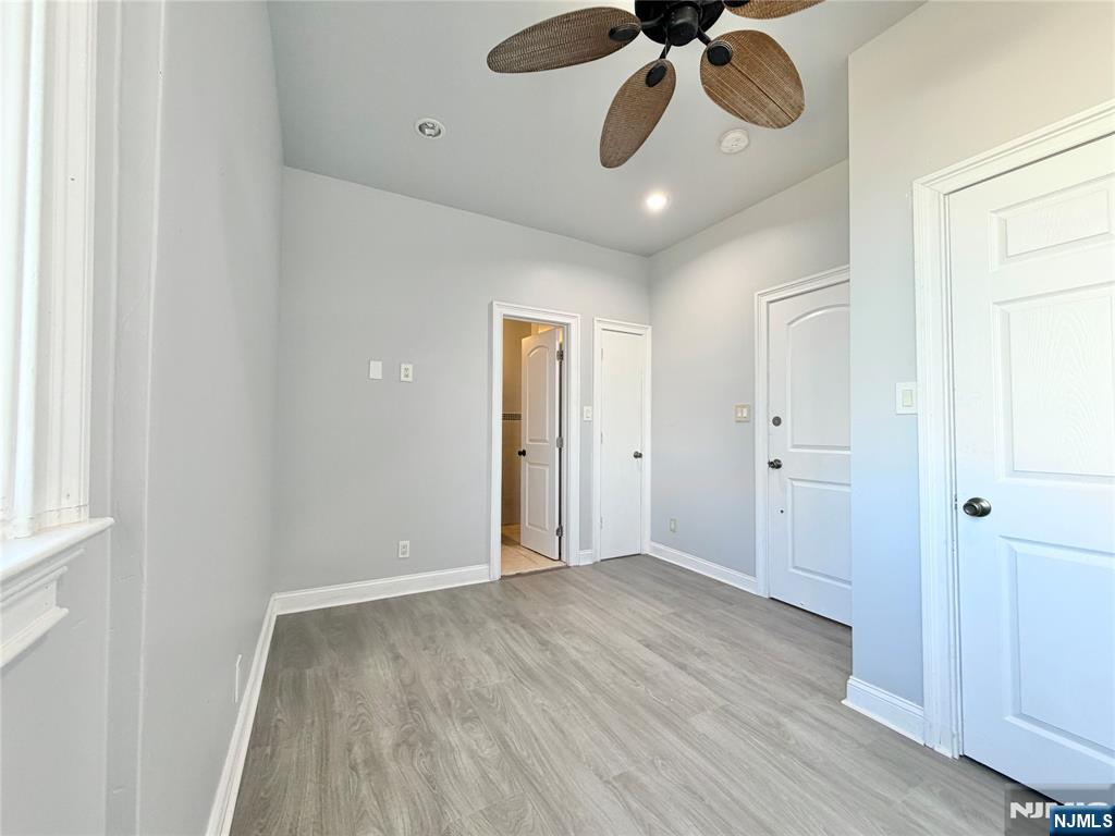 227 Washington Avenue Hackensack, NJ 07601 - Photo 26 of 33 a view of an empty room and wooden floor