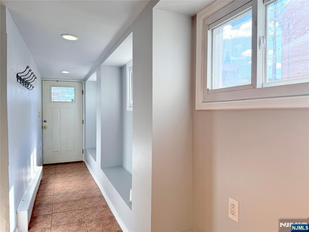227 Washington Avenue Hackensack, NJ 07601 - Photo 4 of 33 a view of hallway with windows