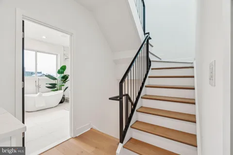 a view of entryway with wooden floor