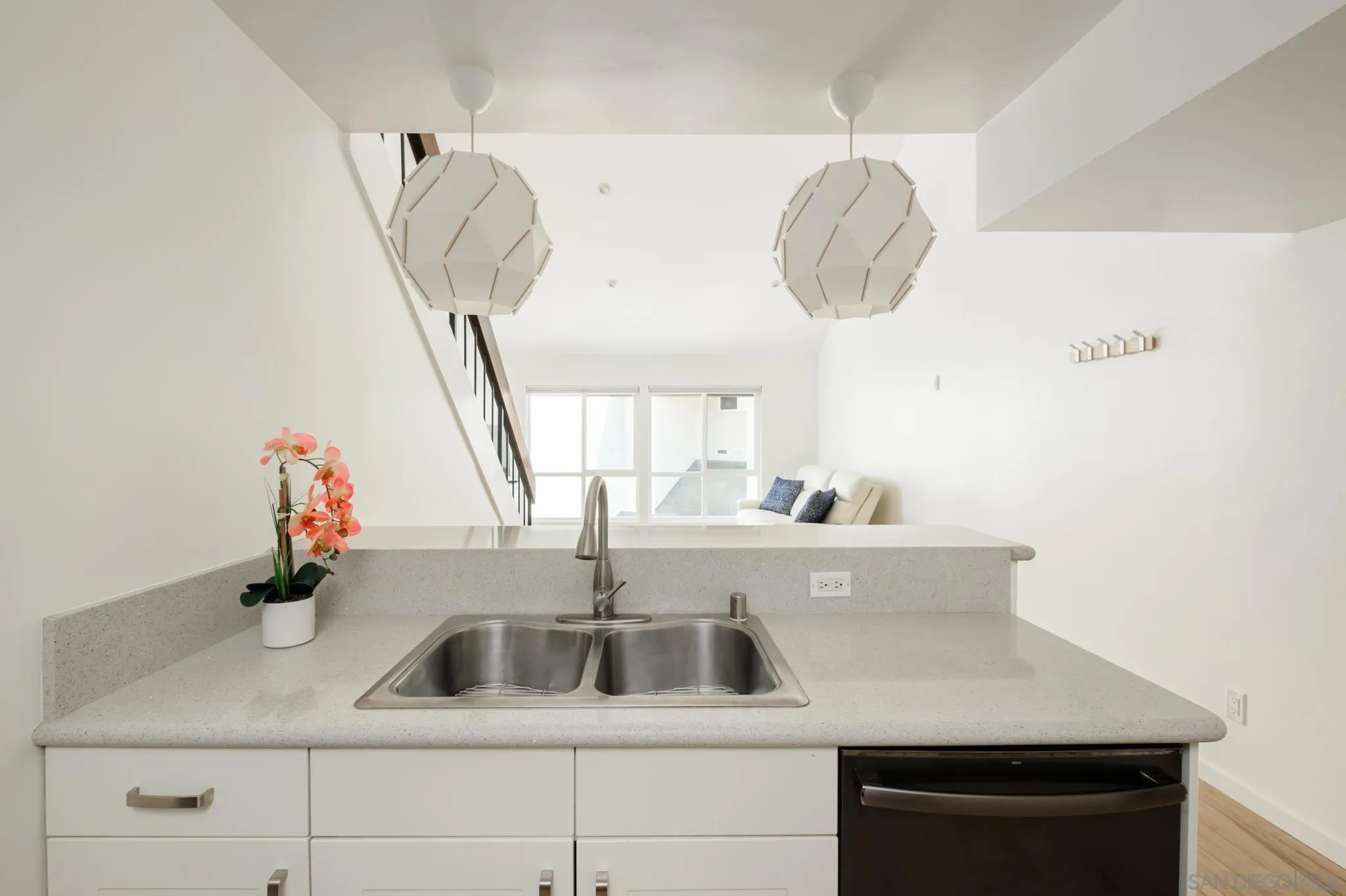 6191 Rancho Mission Road, Unit 309 San Diego, CA 92108 - Photo 6 of 34 a kitchen with a sink and a window
