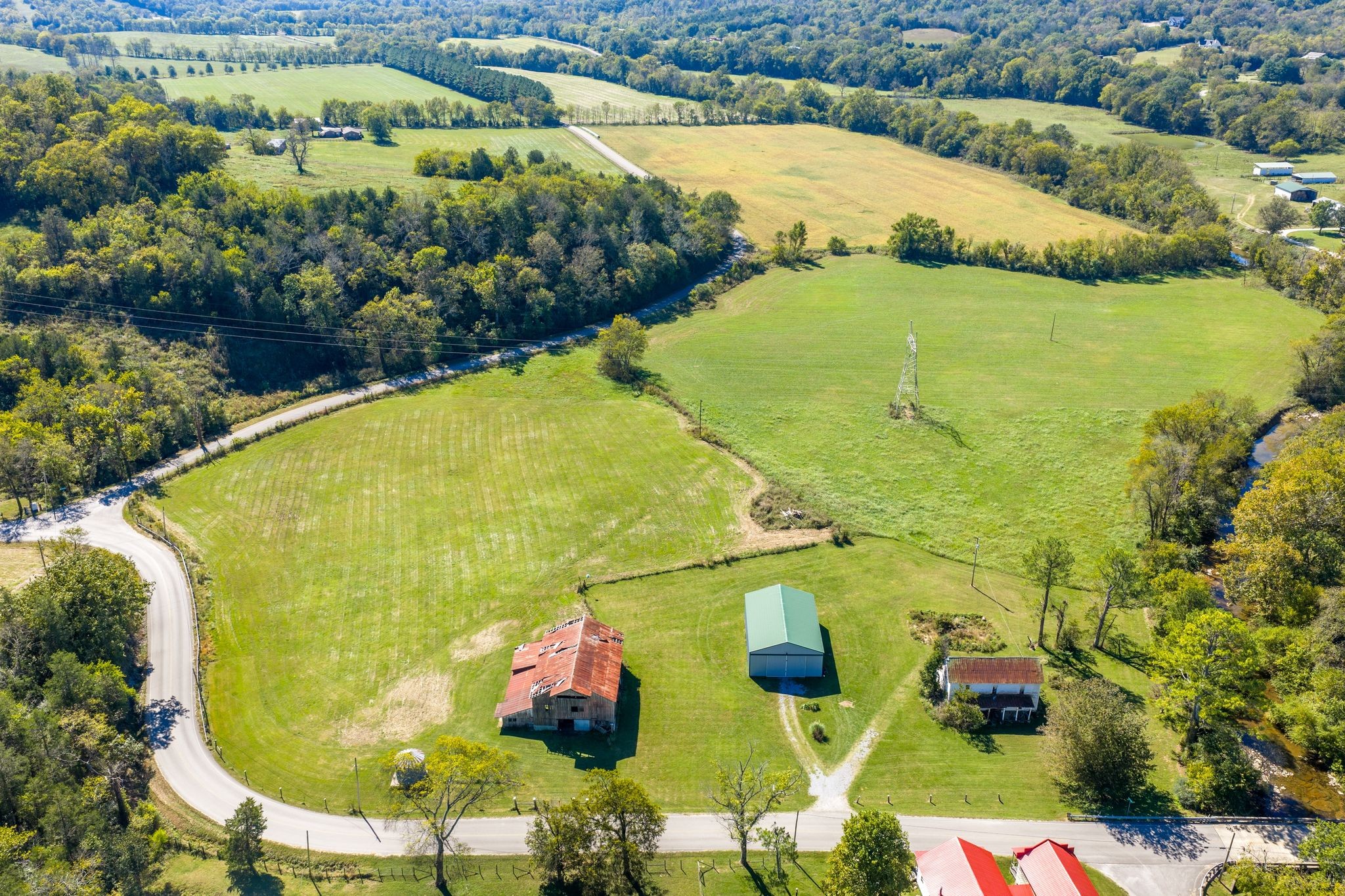 3523 Water Valley Road Williamsport, TN 38487 - Photo 6 of 22 an aerial view of residential houses with outdoor space and swimming pool