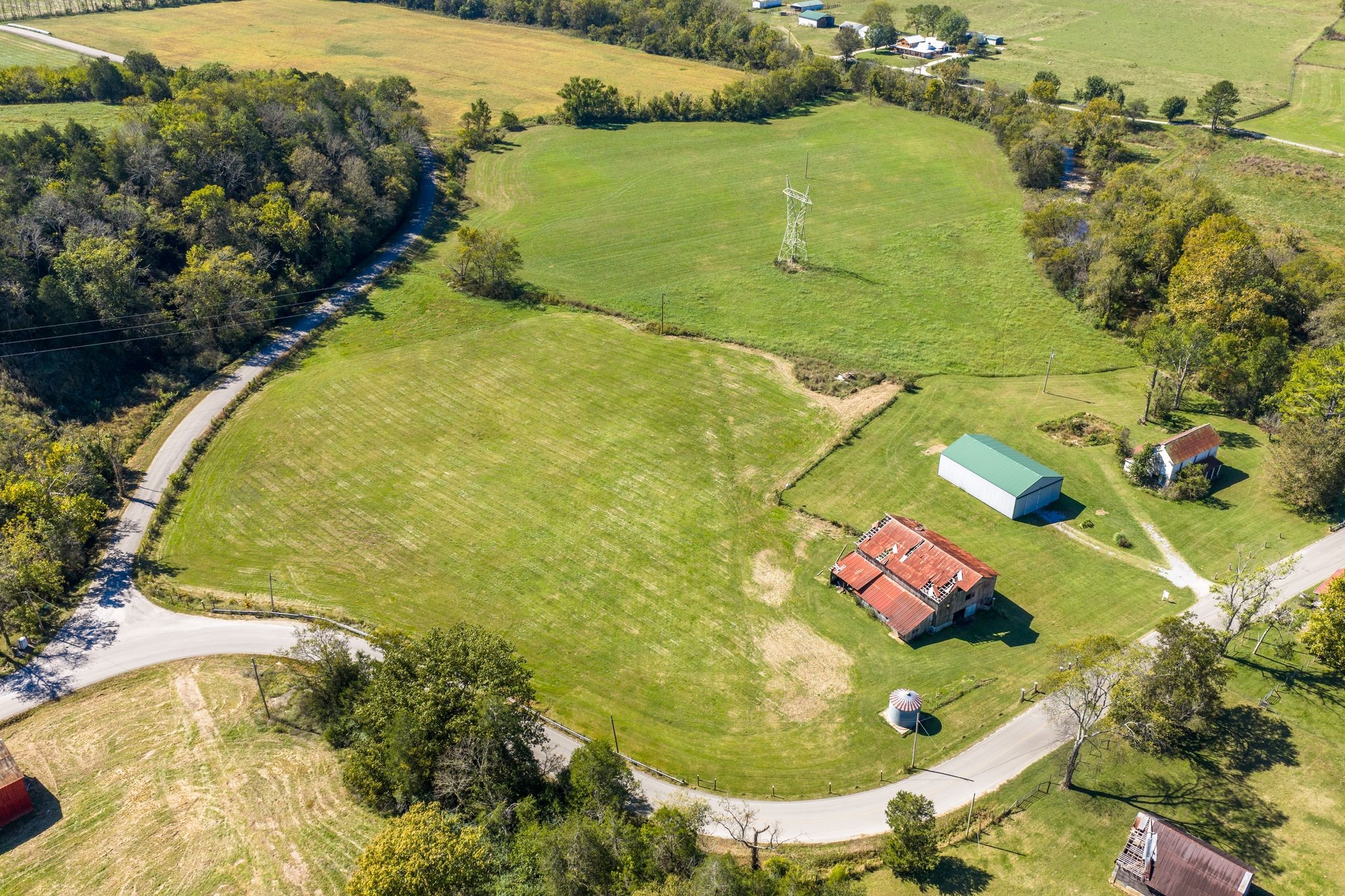 3523 Water Valley Road Williamsport, TN 38487 - Photo 7 of 22 an aerial view of residential houses with outdoor space