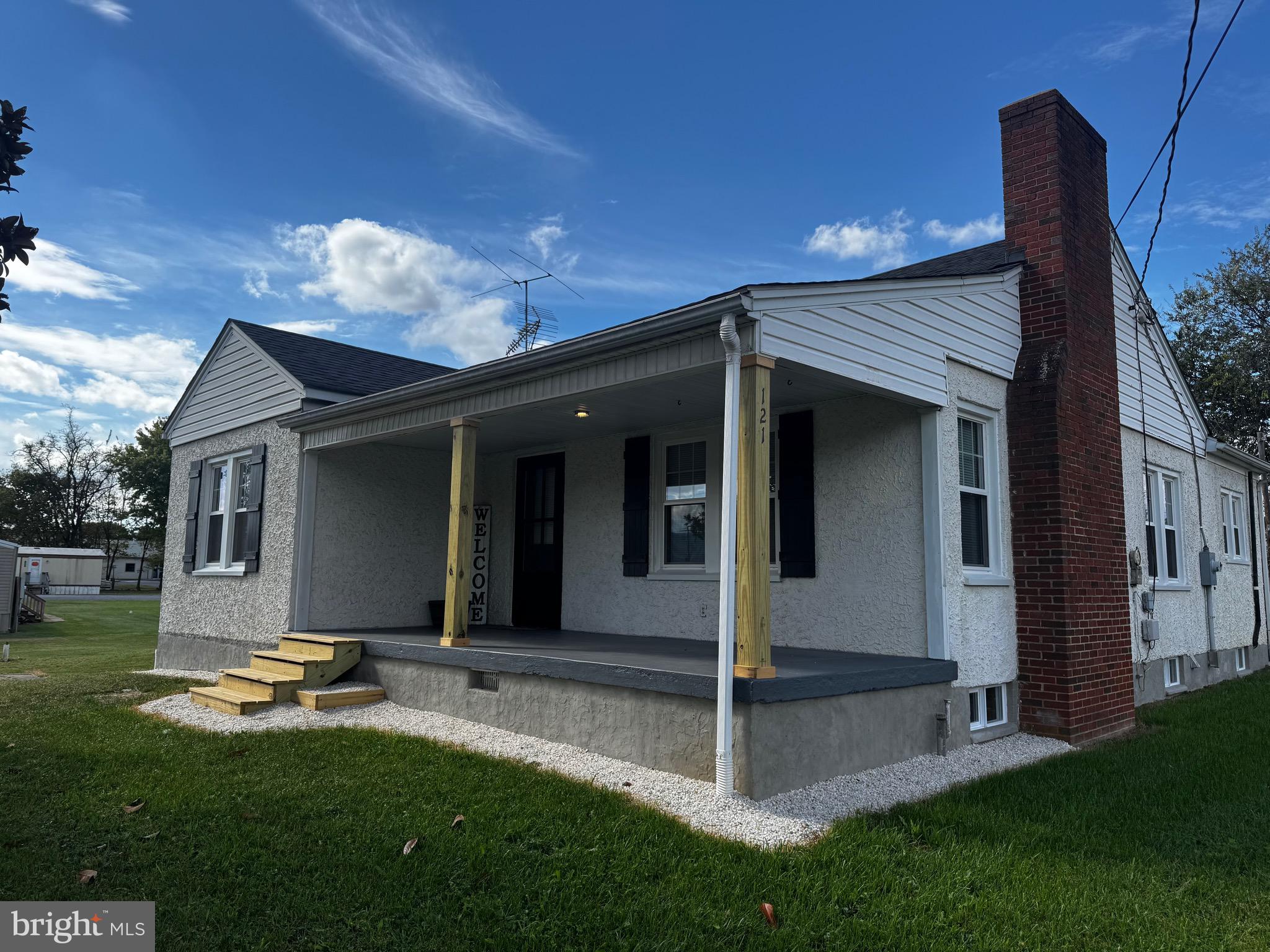 121 Center Street Mount Jackson, VA 22842 - Photo 12 of 46 a view of a house with a yard porch and furniture