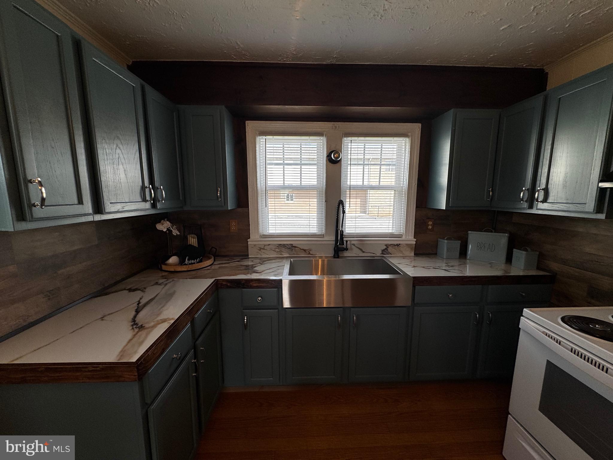 121 Center Street Mount Jackson, VA 22842 - Photo 19 of 46 a kitchen with a sink and cabinets
