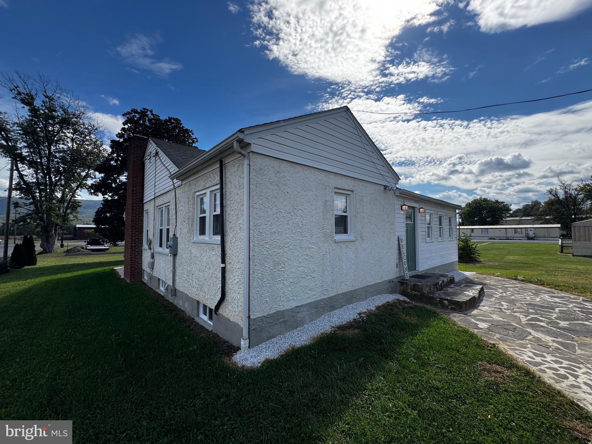 121 Center Street Mount Jackson, VA 22842 - Photo 2 of 46 a backyard of a house with lots of green space