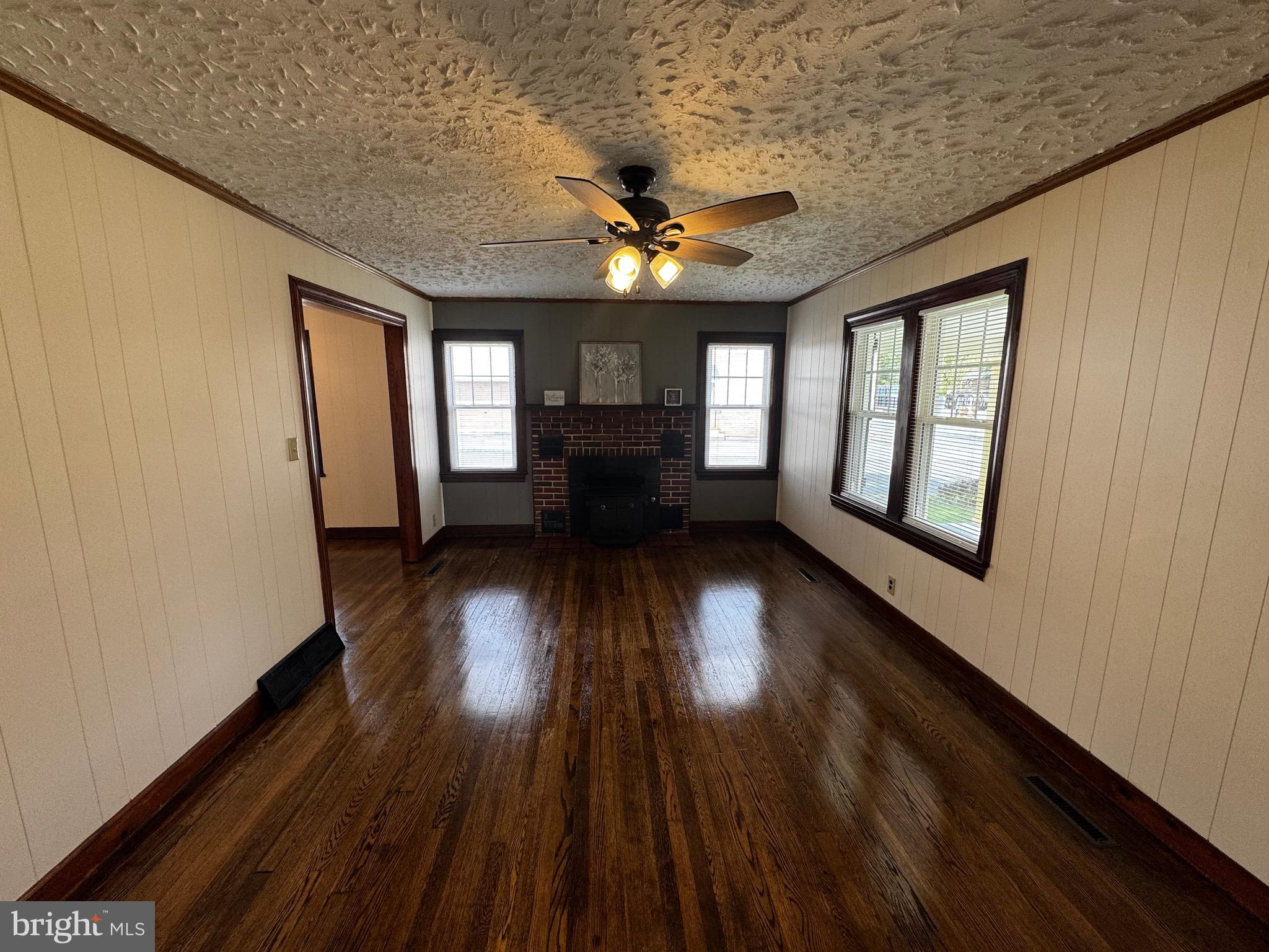 121 Center Street Mount Jackson, VA 22842 - Photo 22 of 46 wooden floor in an empty room with a window