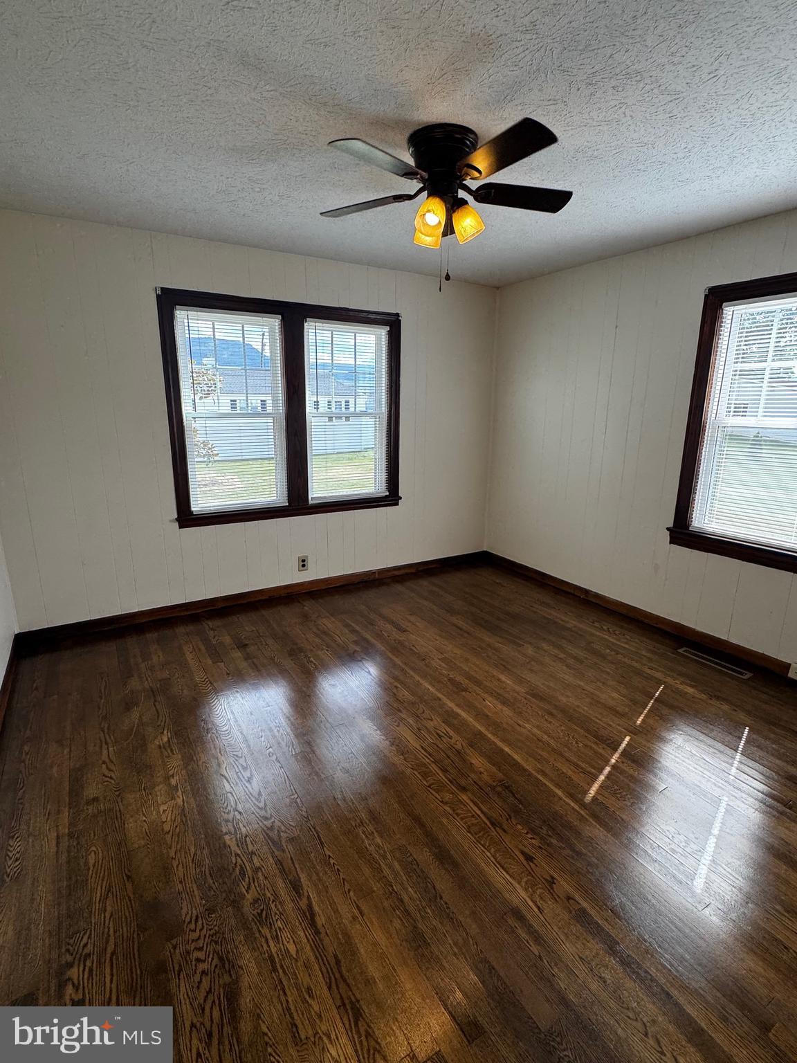 121 Center Street Mount Jackson, VA 22842 - Photo 29 of 46 a view of an empty room with wooden floor and a window