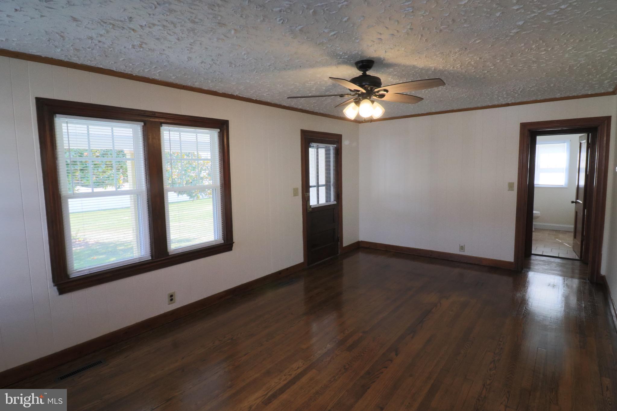 121 Center Street Mount Jackson, VA 22842 - Photo 46 of 46 a view of an empty room with wooden floor and a window