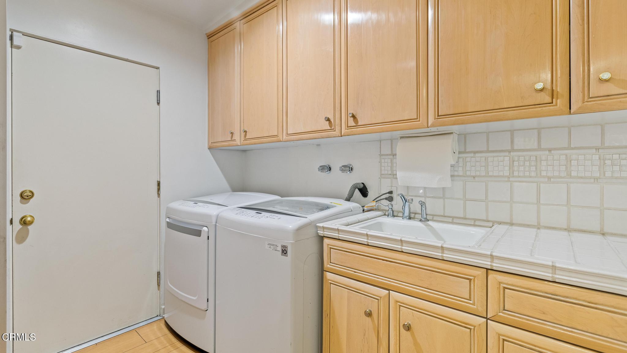 5212 Pizzo Ranch Road La Canada Flintridge, CA 91011 - Photo 13 of 44 a utility room with a sink