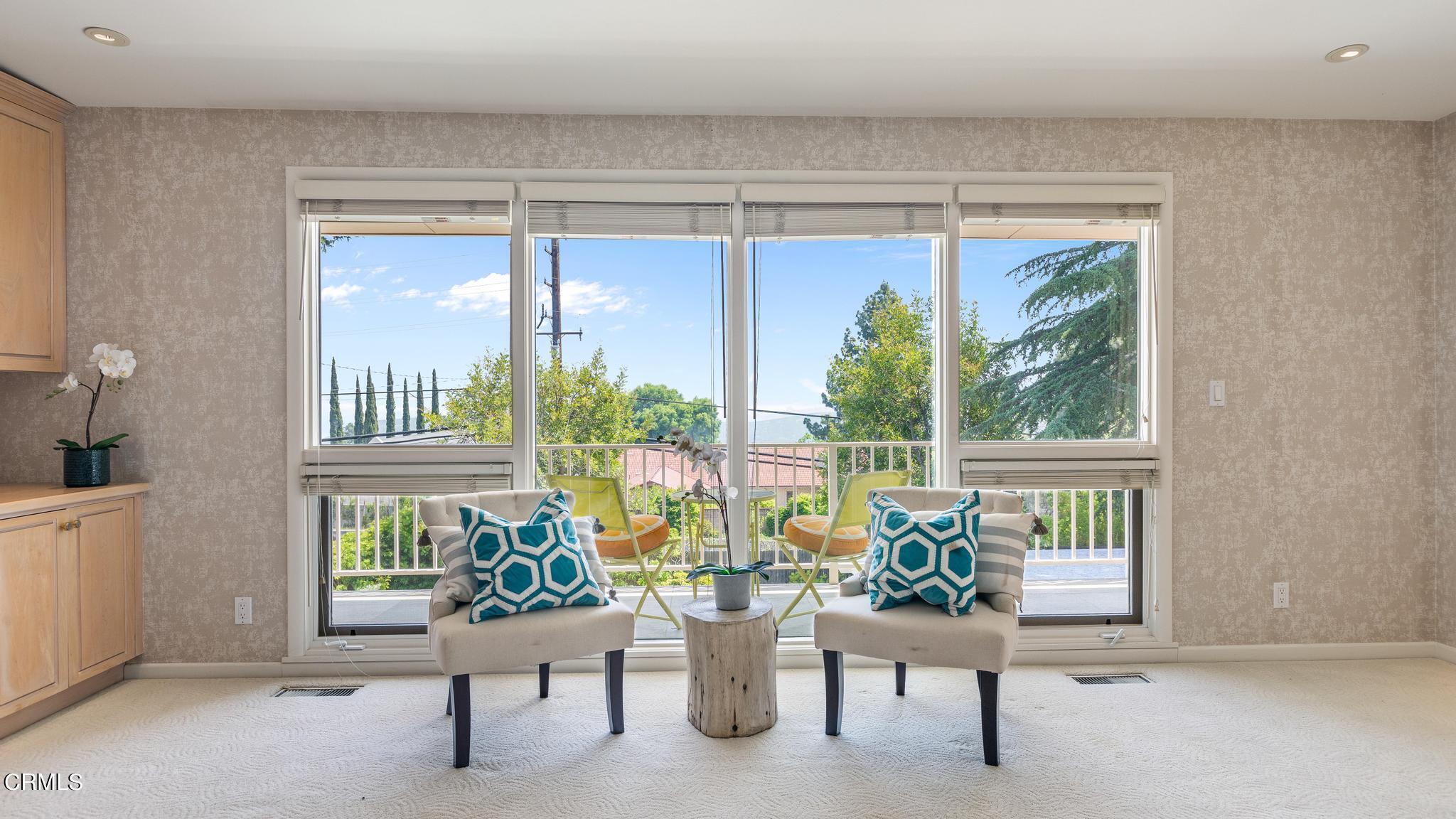 5212 Pizzo Ranch Road La Canada Flintridge, CA 91011 - Photo 16 of 44 a living room with furniture and a window