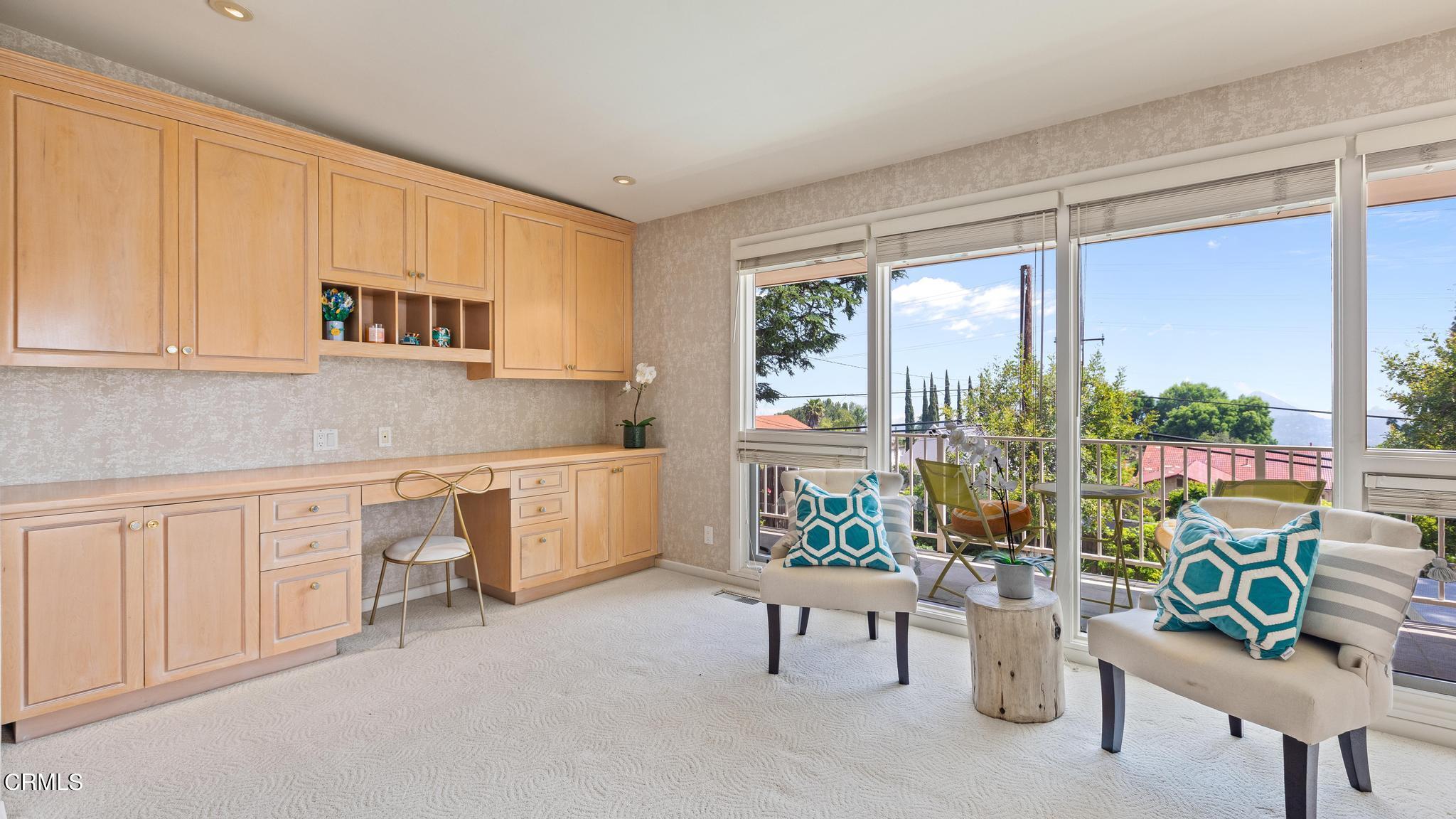 5212 Pizzo Ranch Road La Canada Flintridge, CA 91011 - Photo 17 of 44 a living room with furniture and a window