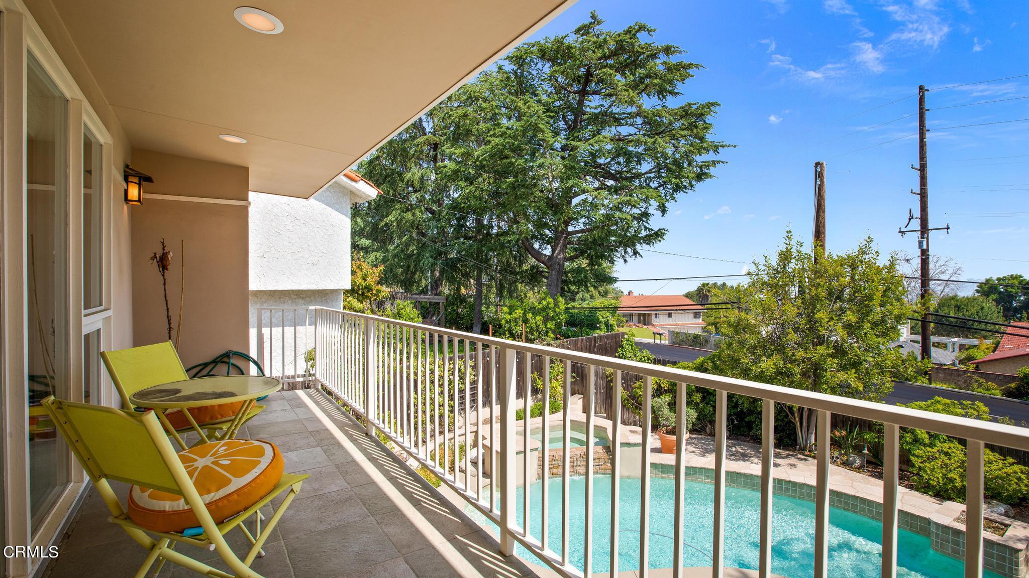 5212 Pizzo Ranch Road La Canada Flintridge, CA 91011 - Photo 21 of 44 a view of a balcony with chairs