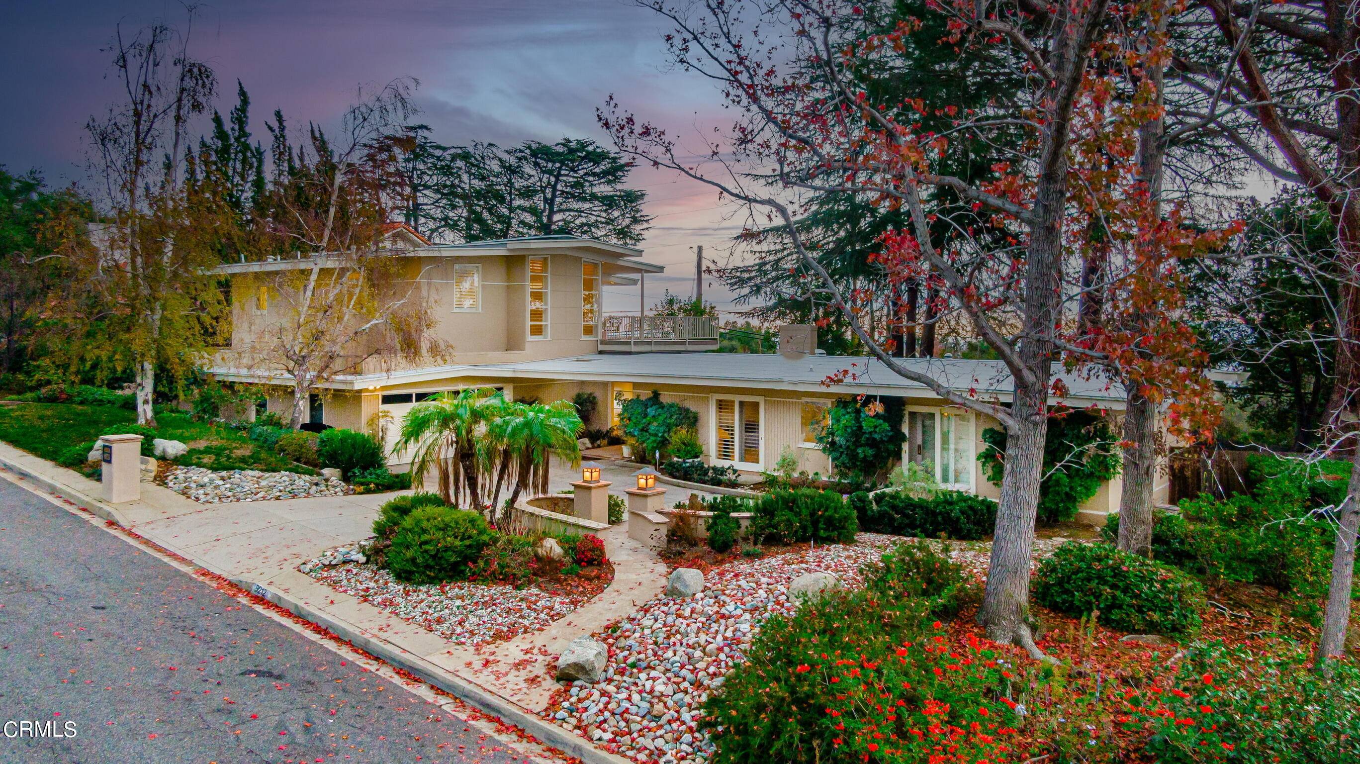 5212 Pizzo Ranch Road La Canada Flintridge, CA 91011 - Photo 3 of 44 front view of a house with a yard