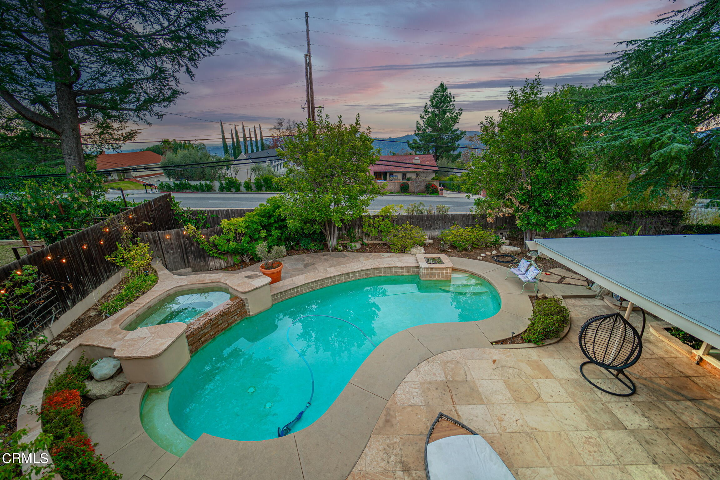 5212 Pizzo Ranch Road La Canada Flintridge, CA 91011 - Photo 36 of 44 a swimming pool with outdoor seating and yard