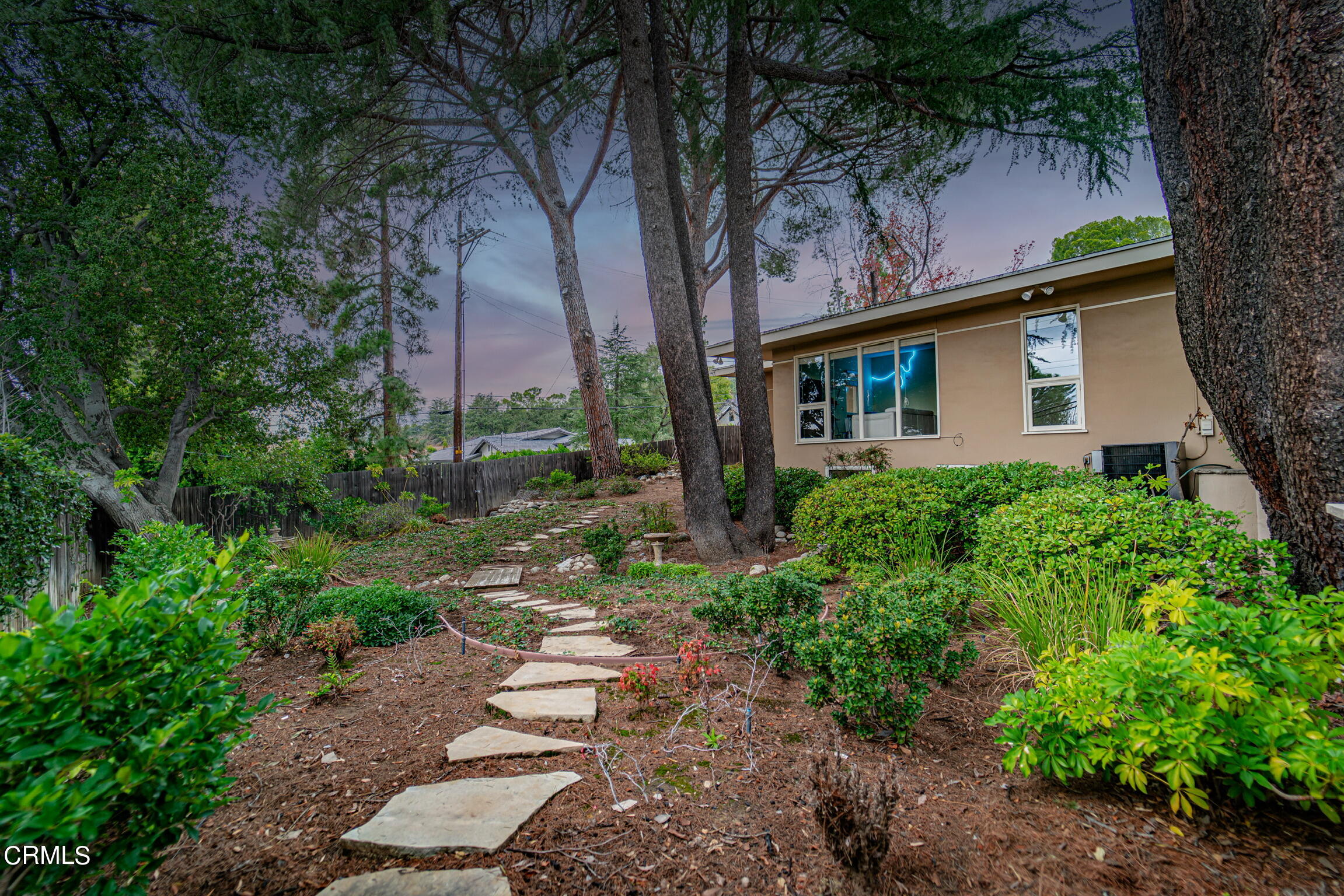 5212 Pizzo Ranch Road La Canada Flintridge, CA 91011 - Photo 40 of 44 a front view of a house with garden