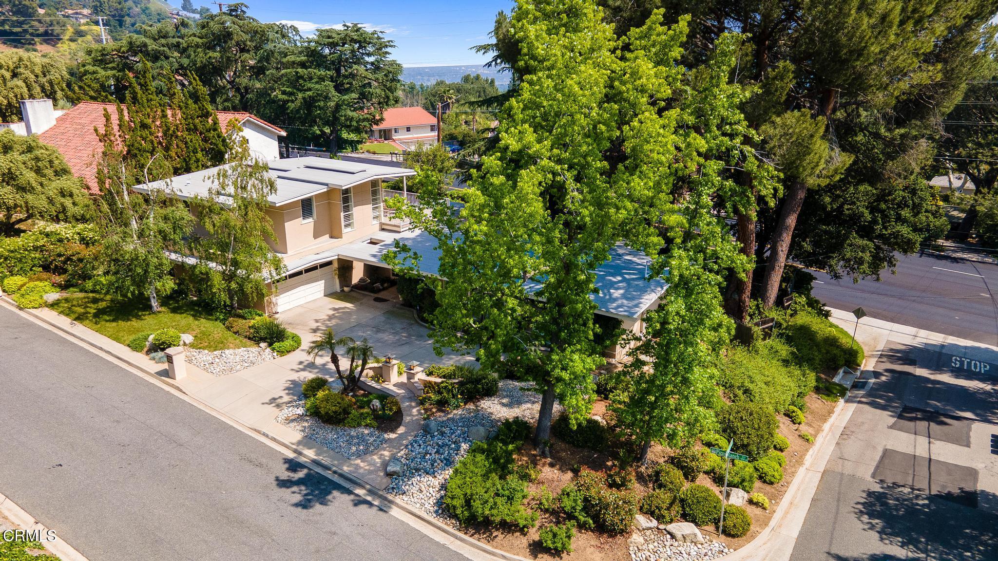 5212 Pizzo Ranch Road La Canada Flintridge, CA 91011 - Photo 41 of 44 an aerial view of a house with a yard and garden