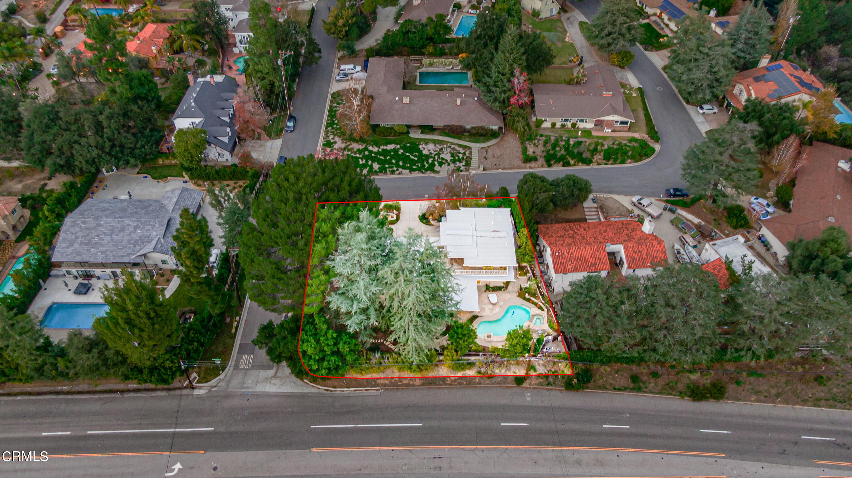 5212 Pizzo Ranch Road La Canada Flintridge, CA 91011 - Photo 42 of 44 an aerial view of a house with a yard
