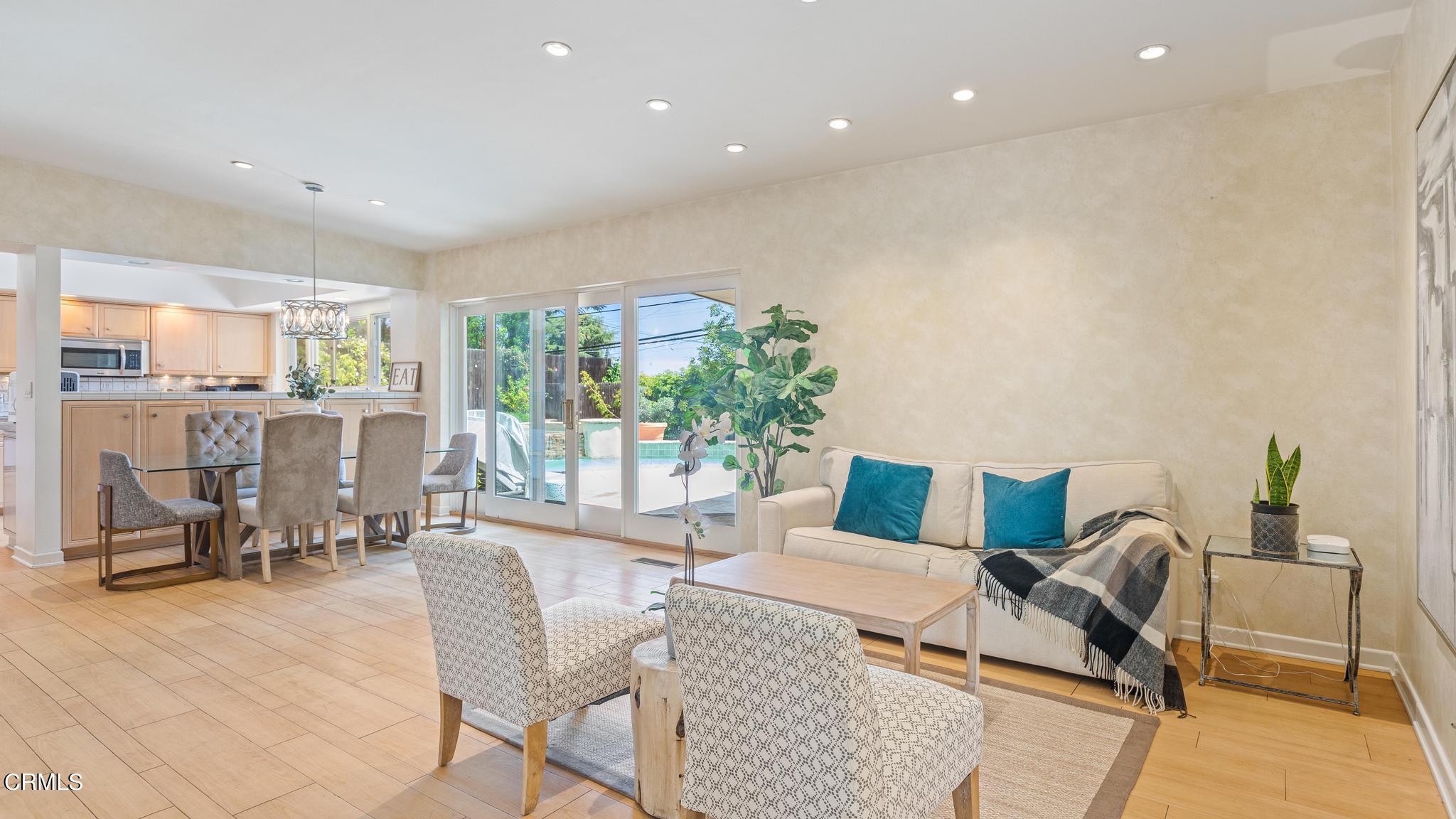 5212 Pizzo Ranch Road La Canada Flintridge, CA 91011 - Photo 8 of 44 a living room with furniture and a large window