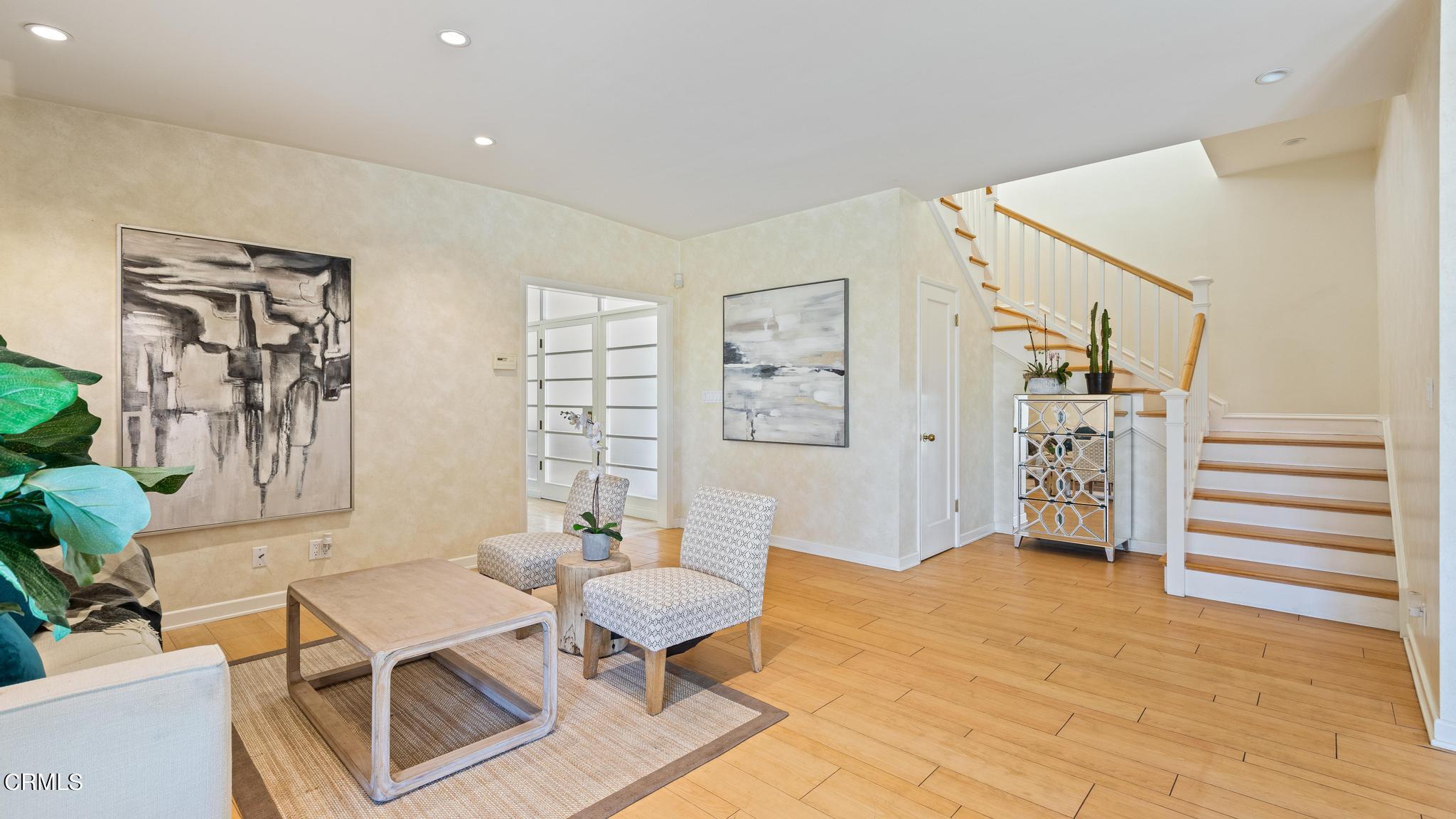 5212 Pizzo Ranch Road La Canada Flintridge, CA 91011 - Photo 9 of 44 a living room with furniture and a wooden floor