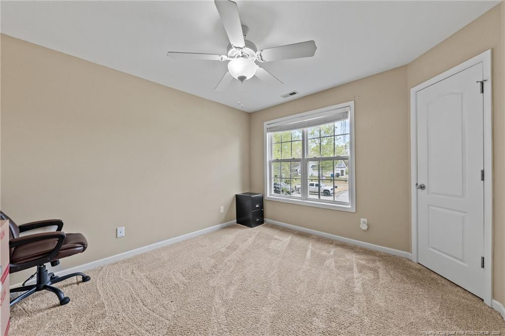 594 Allegiance Street Raeford, NC 28376 - Photo 23 of 49 a view of an empty room with a window