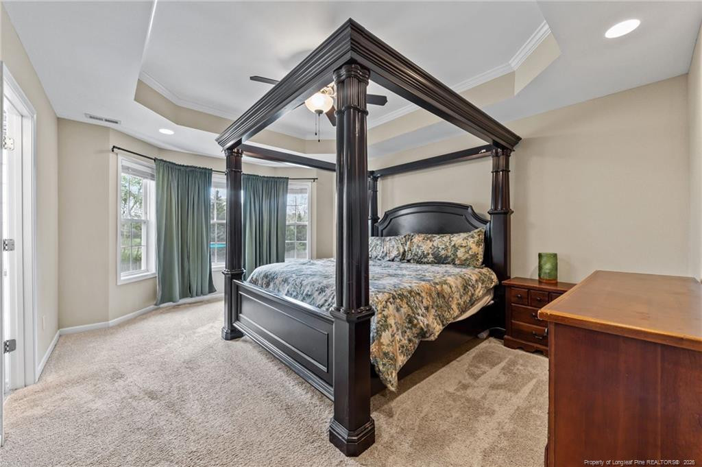 594 Allegiance Street Raeford, NC 28376 - Photo 25 of 49 a bedroom with a bed and a window