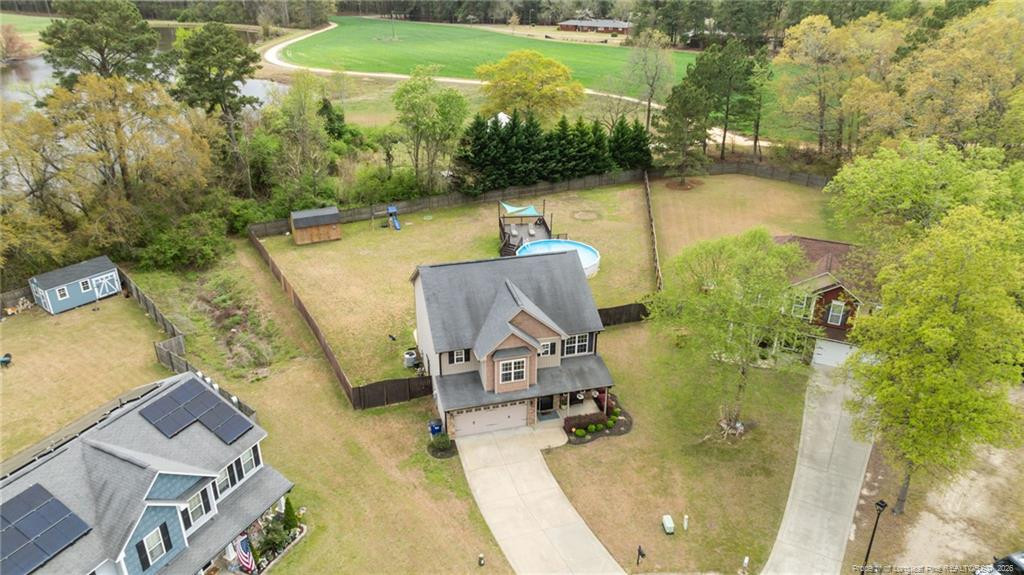 594 Allegiance Street Raeford, NC 28376 - Photo 47 of 49 swimming pool view with a lake view