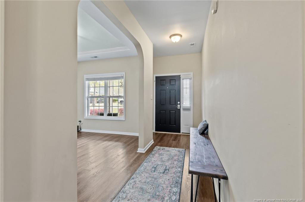 594 Allegiance Street Raeford, NC 28376 - Photo 5 of 49 wooden floor in a livingroom with a window