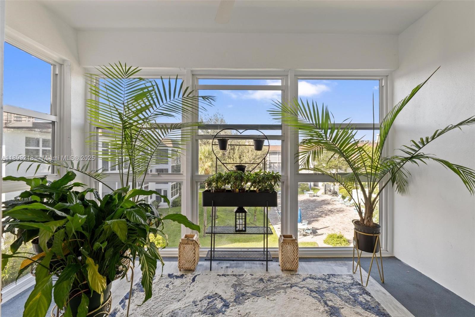 1501 South Ocean Boulevard, Unit 318 Lauderdale-by-the-Sea, FL 33062 - Photo 19 of 26 a view of front door and porch