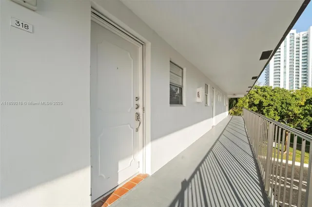 a view of balcony and wooden floor